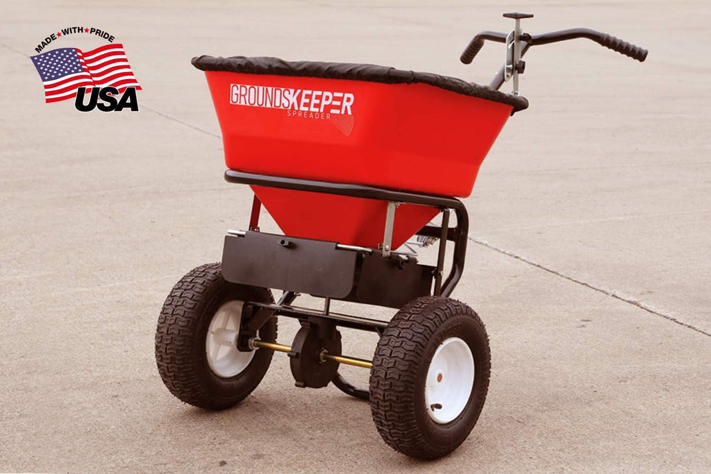 Multi-purpose push-along spreader, 100 lb capacity, versatile tool for lawn seed, salt, de-icer, fertilizer and seeds